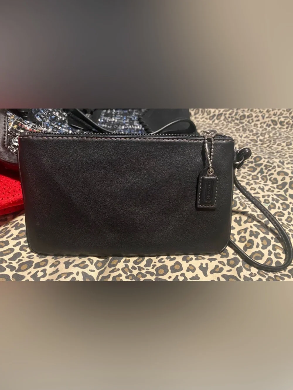 Coach Black Leather Wristlet Clutch with Buckle Accent